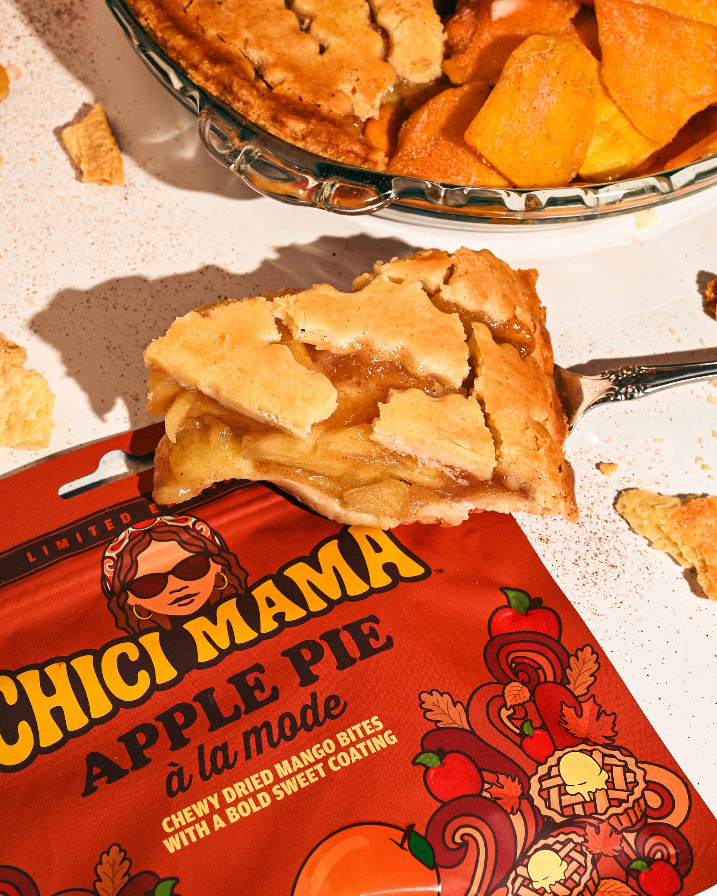A slice of pie, ice cream, and Apple Pie Chewy Mango Bites in the package.